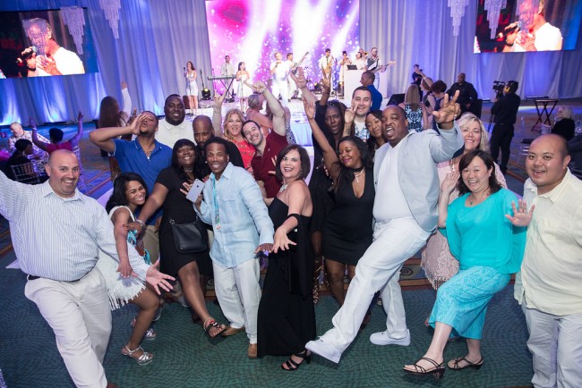 Diverse crowd enjoys entertainment at corporate event