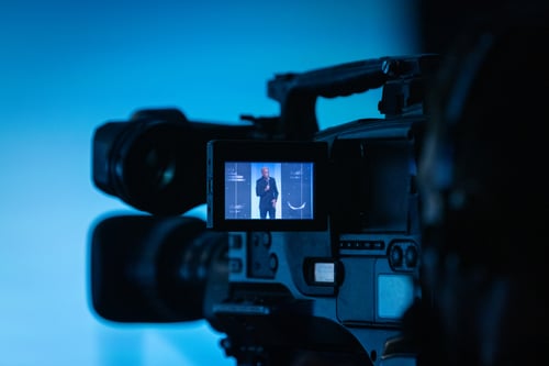 production camera filming stage presentation