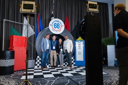 group photo with IHOP 66 backdrop