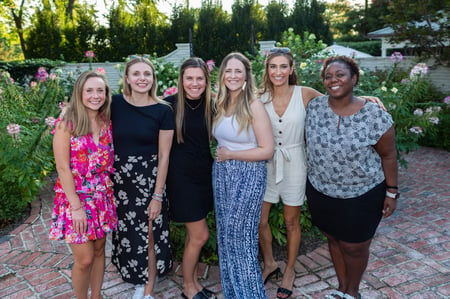 group photo of smiling women