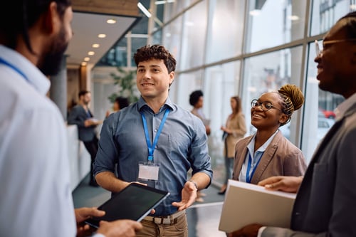 Group of professionals talking to each other