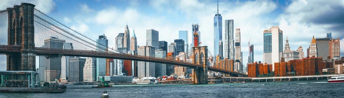 NYC Skyline with Brooklyn Bridge in forefront AdobeStock_298277186