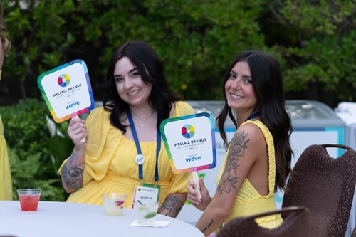 engaged attendees smiling for photo during conference 