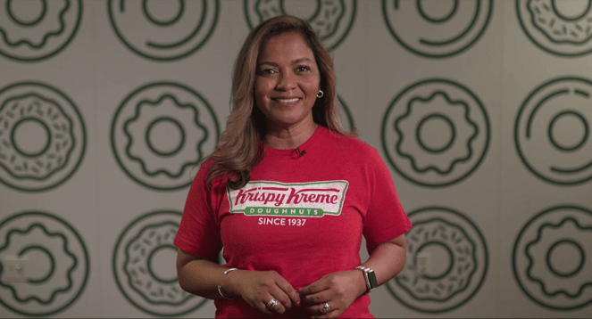 Krispy Kreme presenter smiling
