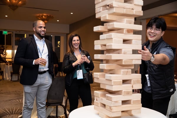 team playing jenga