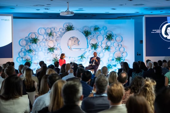 Speakers and an audience at an event